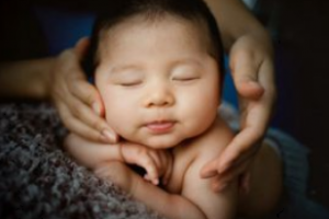 Newborn babies' brain responses to being touched on the face measured for the first time